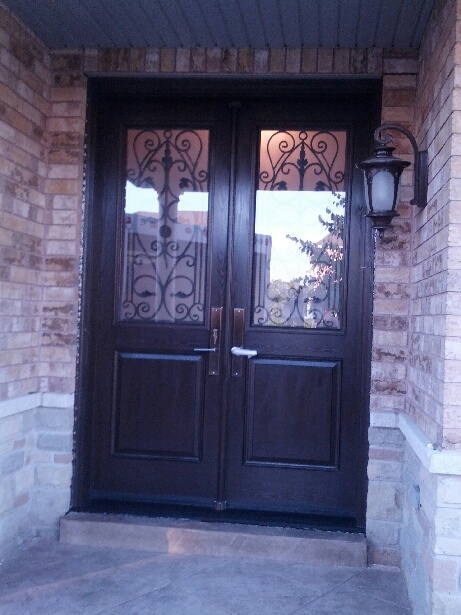 Fiberglass Wrought Iron Door with multi point locks installed in Richmond Hill by windowsanddoorstoronto.ca-Outside View