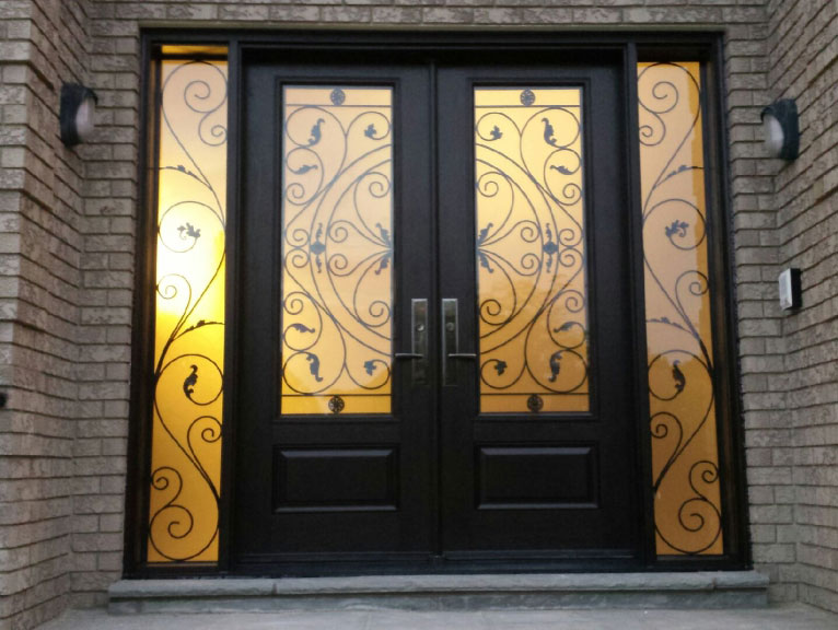 Wrought Iron Fiberglass Doors with 2 side lites and multi point locks installed in Richmond Hill