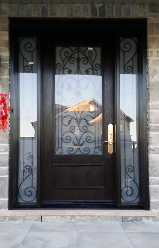 Wrought Iron Fiberglass Woodgrain Door with 2 Side lites and Multi Point Locks Installed in Nobleton