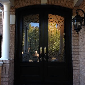 Arch-Fiberglass-Doors-with-Iron-Art-Design-and-Multi-Point-Locks-installed-by-Windows And Doors Toronto