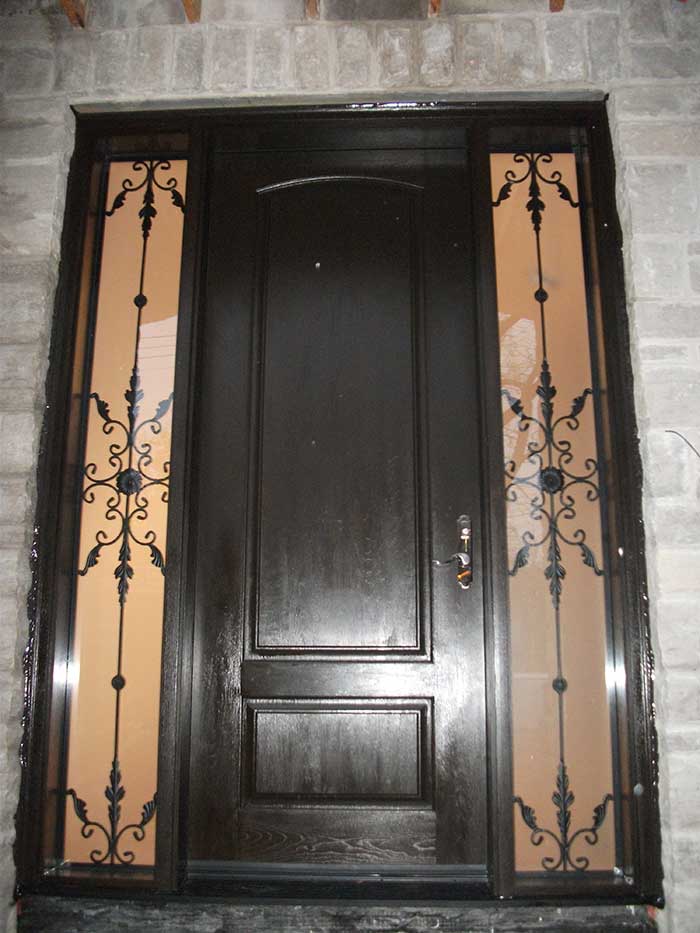 Executive Door, Fiberglass Door Single-Solid-Front-Door-with-2-Iron-Art-Side-Lites-Installed-in-Brampton by Windows and Doors Toronto