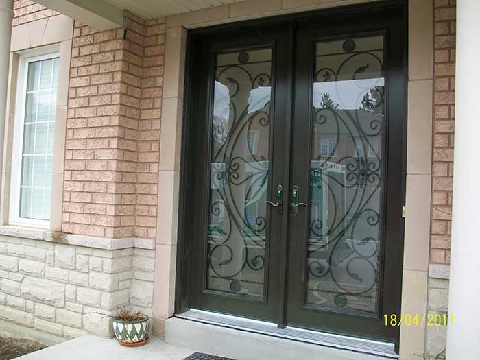 Exterior Doors-Woodgrain Double Doors Fiberglass Juliate Iron Art Design with Multi Point Locks by windows and doors toronto