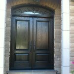 Fiberglass Wood Grain Doors with Iron Art Design Transom Installed in Etobicoke by Windows and Doors Toronto
