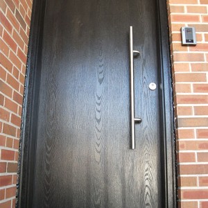 Modern Woodgrain Single Door Installed by Windows and Doors Toronto