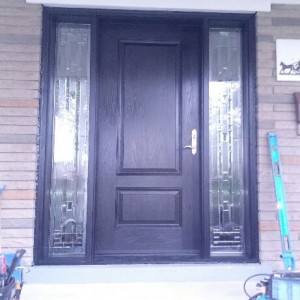 Wood Grain Doors with 2 Stained Glass Side lites installed in Toronto by Windows and Doors Toronto