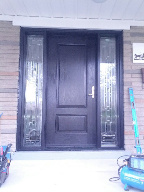 Wood Grain Doors with 2 Stained Glass Side lites installed in Toronto by Windows and Doors Toronto