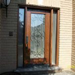 Woodgrain Door, with Paris Design & 2 side Lites Installed by Windows and Doors Toronto in Toronto