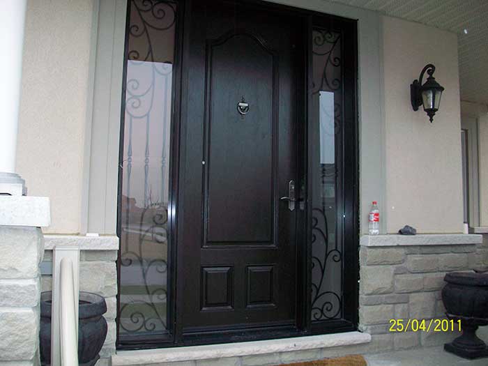 wood grain Door with 2 Iron Art Side Lites installed by Windows and Doors Toronto