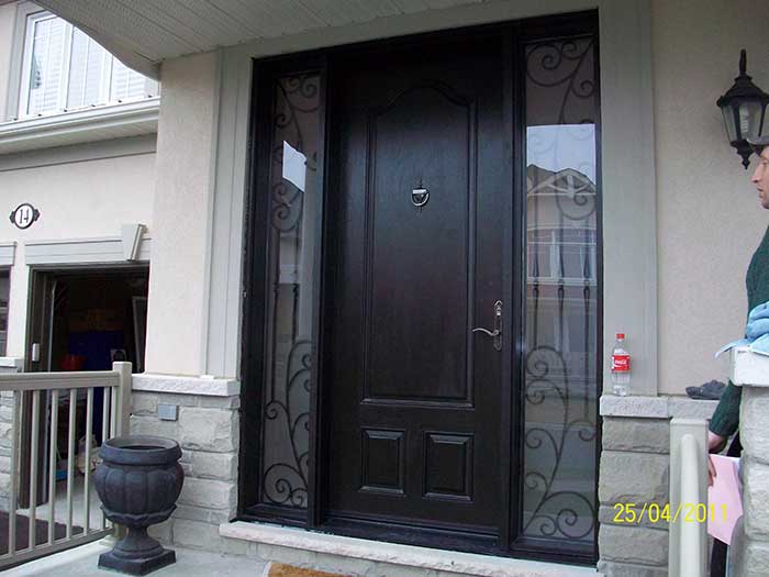 wood grain Door with 2 Iron Art Side Lites installed in Mississuaga installed by Windows and Doors Toronto