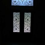 8-Foot Doors, Fiberglass-Milan-design-Front-Door-with-Matching-Iron-Art-Design-Transom-Installed-in-Custom-Build-Home- by Windows and Doors Toronto