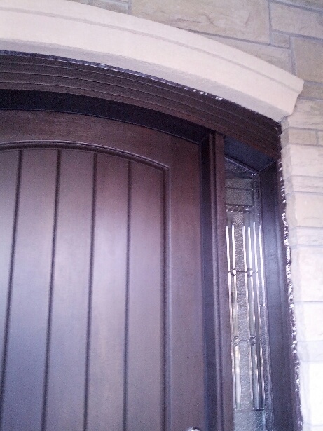 Arched Fiberglass Door-Rustic Fiberglass Door installed by windowsanddoors.ca in Vaughan