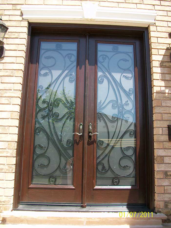 Custom Doors- fiberglass woodgrain 8 foot with 22 by 80 Custom Glass installed by Windows and Doors Toronto in Thornhill