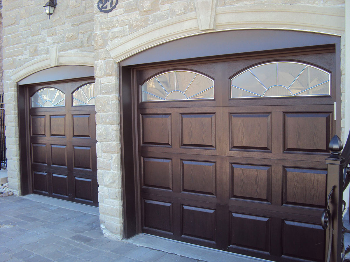 Fiberglass Woodgrain Garage Doors with Windows installation by Windows and Doors Toronto in Richmond Hill