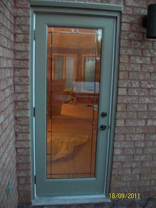 Flush Glazed Smooth Door installation by Windows and Doors Toronto