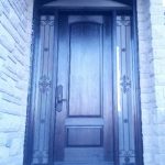 Front Entry Custom Fiberglass Door with Custom Wrought Iron Side Lites & Transom installed in Toronto by windowsanddoorstoronto.ca