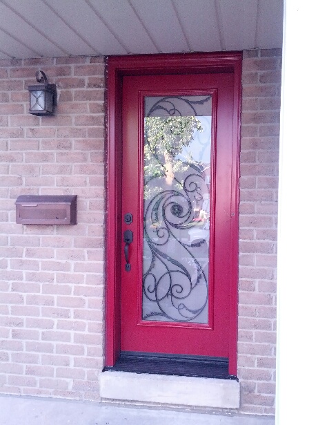 Front Single Entry Door with Wrought Iron Design installed in Brampton by windowsanddoorstoronto.ca