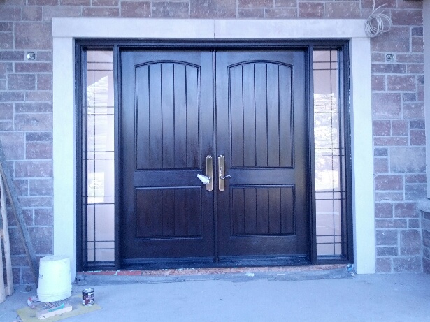 Oversized Rustic Front Entry Doors with 2 Side Lites installed in New Construction Custom Home in Klineburg by windowsanddoorstoronto.ca