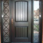 Rustic Door, Single Solid Fiberglass Door with 2 side lights and Iron Art installed by Windows and Doors Toronto