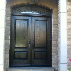 Wood Grain Fiberglass Doors with Iron Art Design Transom by Windows and Doors Toronto Installed in Etobicoke