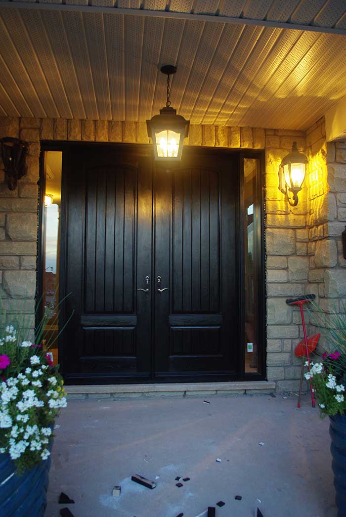Wood grain Fiberglass Doors with Rustic and 2 Side lites installed by Windows and Doors Toronto in Richmondhill Ontario