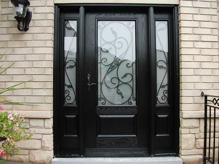 Wood grain Glass Design Door with 2 Iron Art Side Lites installed by Windows and Doors Toronto in Orillia