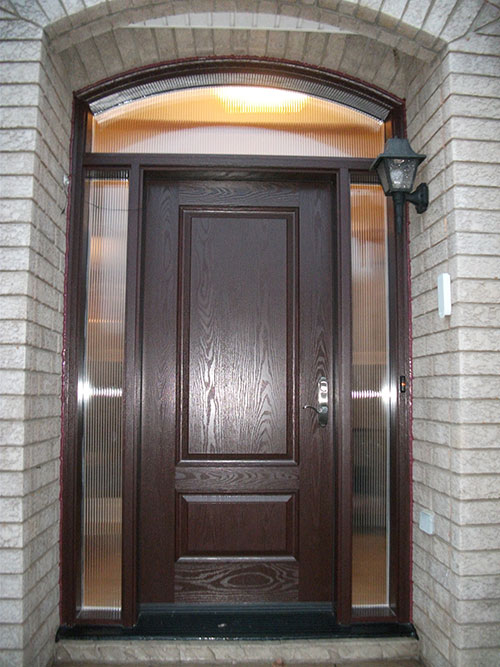 wood grain exterior door with 2 side lites and arch transom Installed by Windows and Doors Toronto