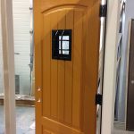 Fiberglass Rustic Door-Front Entry Door with Easyspeak Medieval Design During Manufacturing by windowsanddoorstoronto.ca