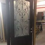 42 inch Oversized Fiberglass Woodgrain With Custom Iron Art and Custom Bottom Panel During Manufacturing by windowsanddoorstoronto.ca