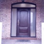 Fiberglass Woodgrain Rustic Front Door with 2 Frosted Side Lites and Arched Transom installed by Windows and Doors Toronto