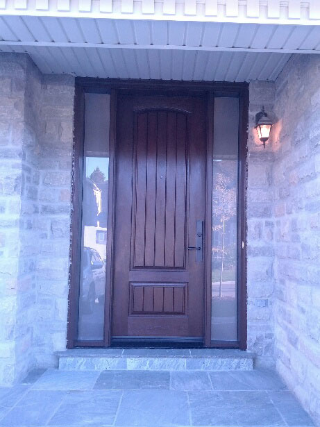 Fiberglass Woodgrain Rustic Front Door with 2 Frosted Side Lites and Multipoint Locks installed by windowsanddoorstoronto.ca