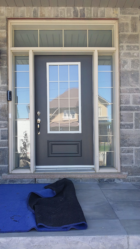 Wrought Iron Fiberglass Woodgrain Door with 2 Side lites and Multi Point Locks Installed in Nobleton