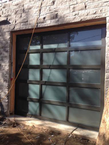Contemporary Garage Doors- Modern Aluminium Garage Door with Door Lites installed in Oakville by modern-doors.ca