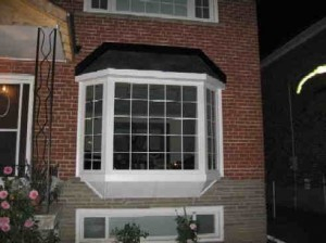 Installation of Bay Window Basement Windows in Toronto.