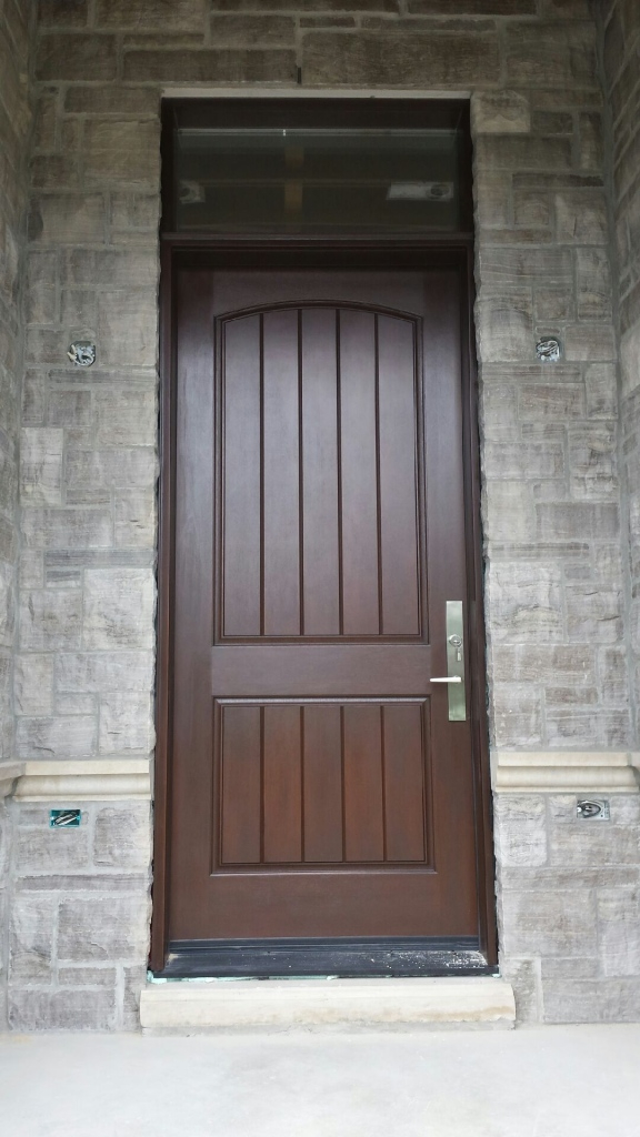 Rustic Mahogany Fiberglass Front Ddoor with Transom installed in Oakville by Windows and Doors Toronto